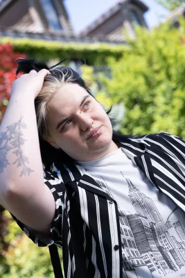 Sant's mostly black-and-white fashion lets his creativity make a colorful statement. Photo: John Taylor.