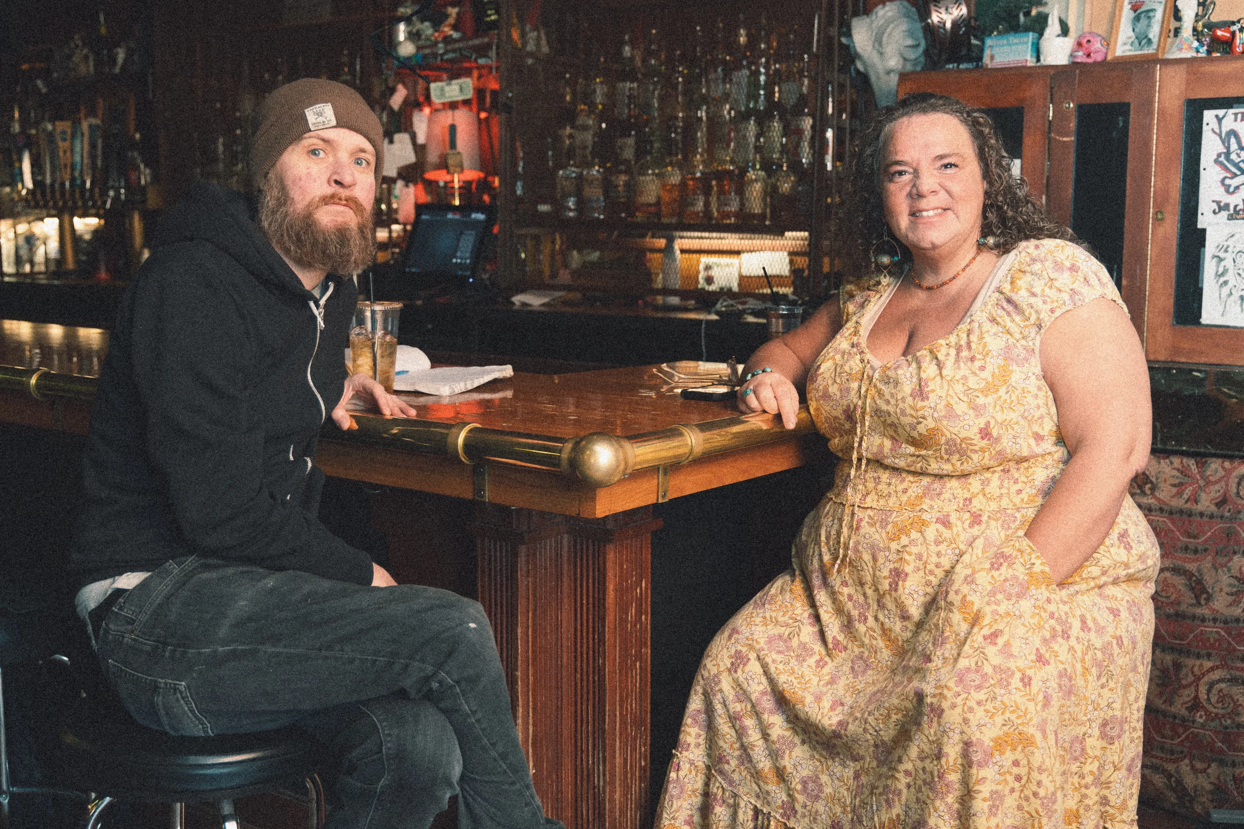 Mike Brown and Sunyin Marci sit at The Jackalope Lounge.