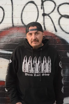 A profile shot of Olifer of Olifer Rock Shop.