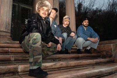 (L-R) Eli Andersen, Tate Grimshaw, Jerick VanPatten, Diego Labrador sitting on the steps.