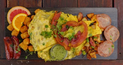 Tater Tot skillet: eggs and ham on top of a bed tater tots. Photo: Talyn Bezhad.