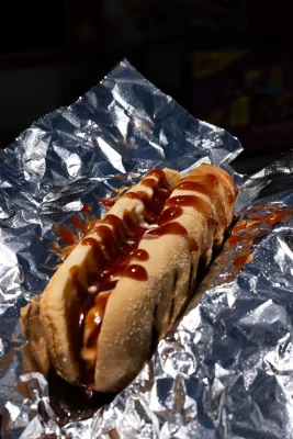 Da Good, a classic all-beef frank in a natural casing, and Da Fat G, a bacon-wrapped beef hot link buried in chili and cheese with a hint of mustard.