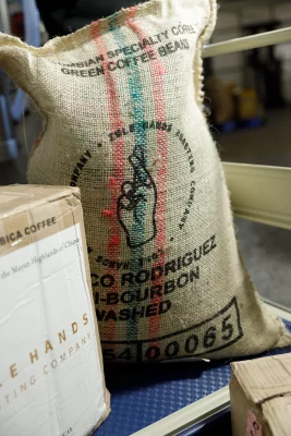 A hempen bag of coffee beans.