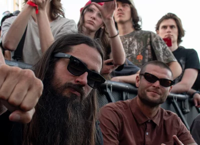 The crowd sits down between sets at Kilby Block Party.