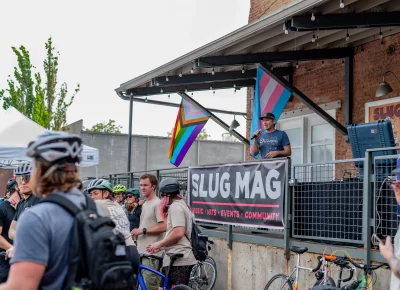 John Ford shows off his great announcer voice at SLUG HQ. Photo: Ashley Christenson.
