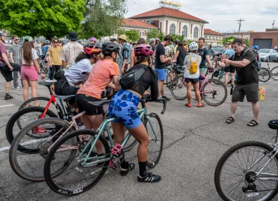 Cyclist friends line up for a photo from John Barkiple. Photo: Ashley Christenson.