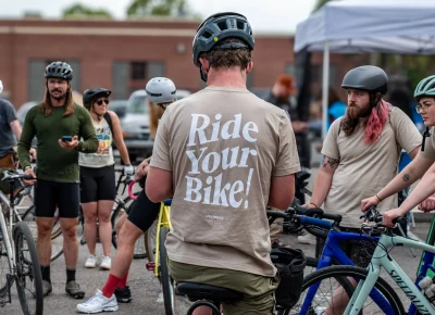 A participant shares a message with those around them. Photo: Ashley Christenson.