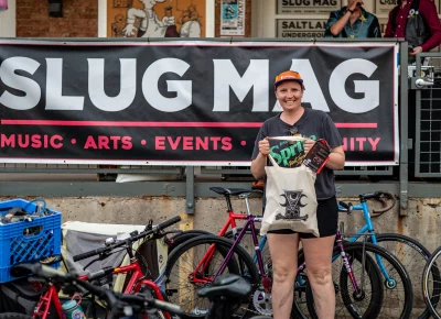 Alea Clymer celebrates their award for placing third in the non-binary division. Photo: Ashley Christenson.