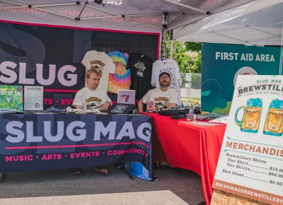SLUG's brand ambassadors held down the fort to sell merch. Photo: Talyn Behzad.