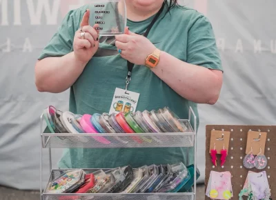 Keep it Kewl showcases some of their handmade goods like the Fuck Around and Find Out coaster to rest your brew on. Photo: Talyn Behzad.