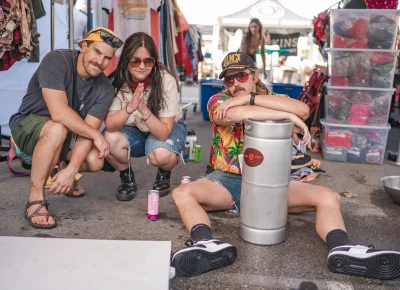 Grid City Brewery deconstructs their booth after selling out at the end of the event. Photo: Talyn Behzad.