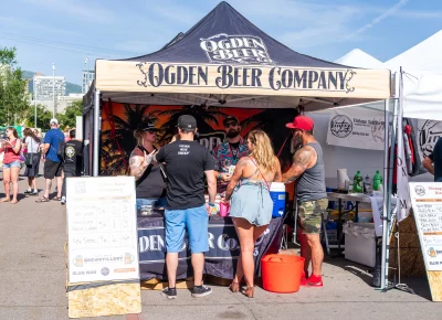 (From left to right) Jackie and Corey chat with some Brewstillery goers about their brewing process for their NewSkool beer. Photo: Chay Mosqueda.