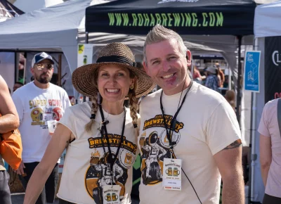 SLUG's Angela H. Brown and John Ford celebrate the fruits of their labor at Brewstillery! Photo: Brayden Salisbury.