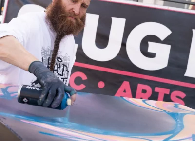 Ben Wiemeyer paints live for the crowd at Brewstillery. Photo: Brayden Salisbury.