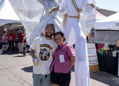 Everyone looks small next to the stilt walkers! Photo: Brayden Salisbury.