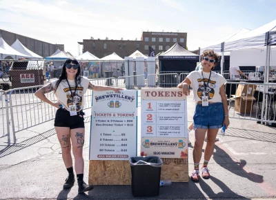 If you want in, you're gonna have to get past SLUG editors Emma and Asha. Photo: Brayden Salisbury.