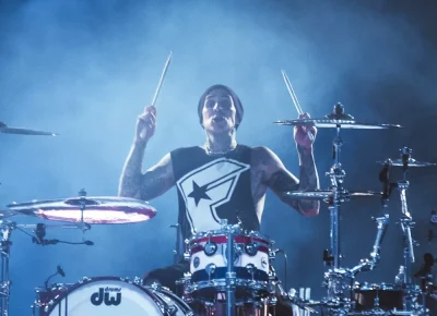 All eyes are on Travis Barker during his impressive drum solo.