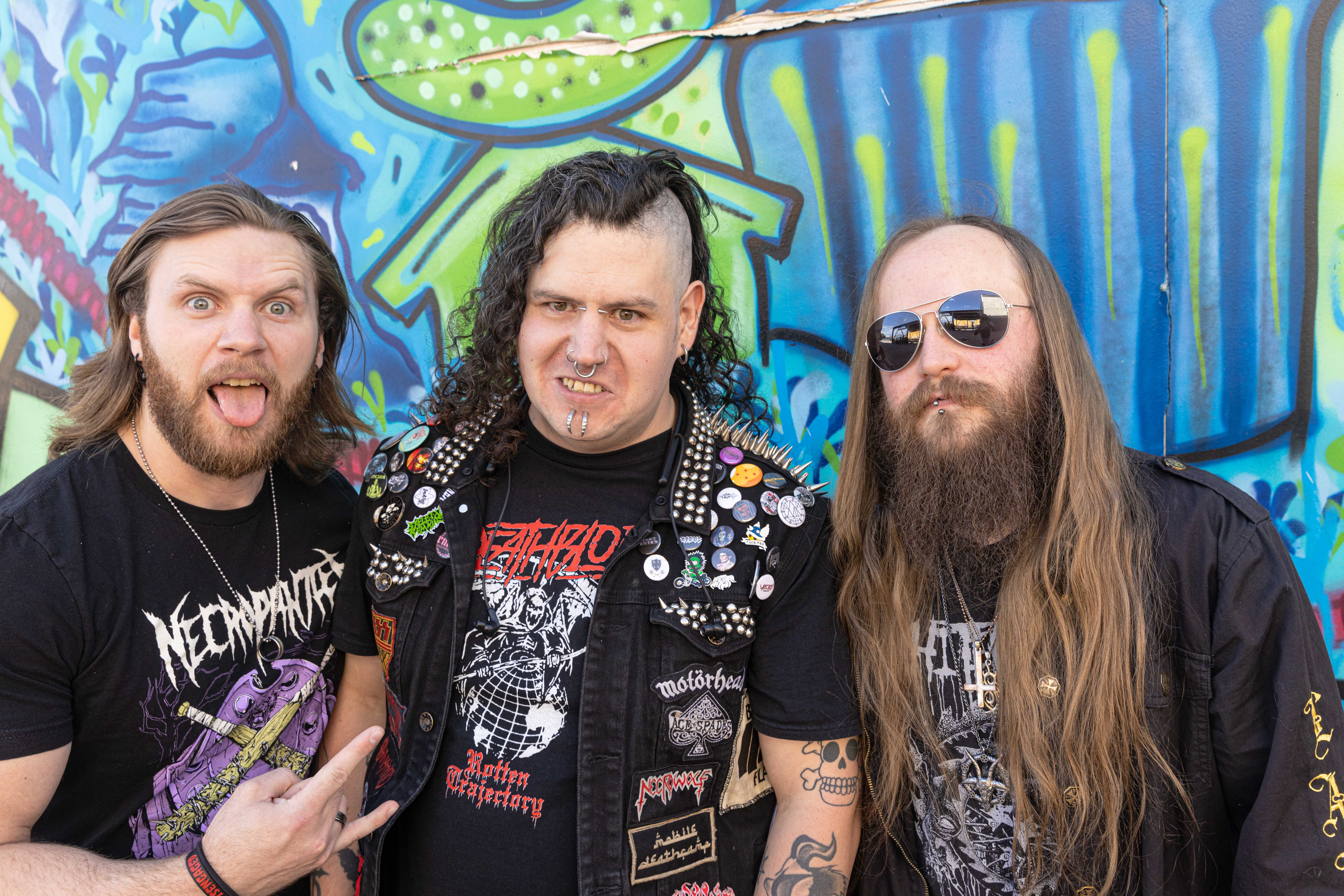 Three members of DiseNgaged pose together.