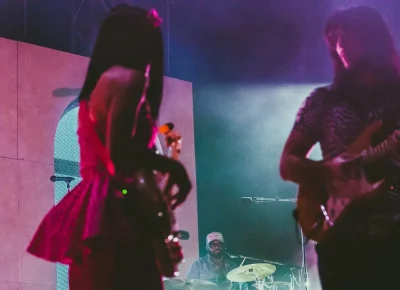 The Khruangbin Trio jamming altogether on stage.