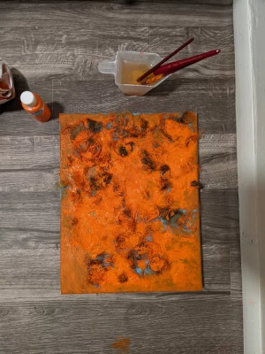 Lewis Figun Westbrooks' "Split Hair," hair on a bright orange canvas. 