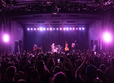 Bikini Kill commanding the crowd.