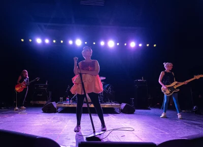 All three of the Bikini Kill trio rocking out.
