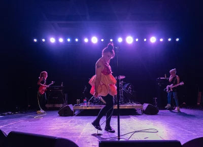 All three of the Bikini Kill trio rocking out.