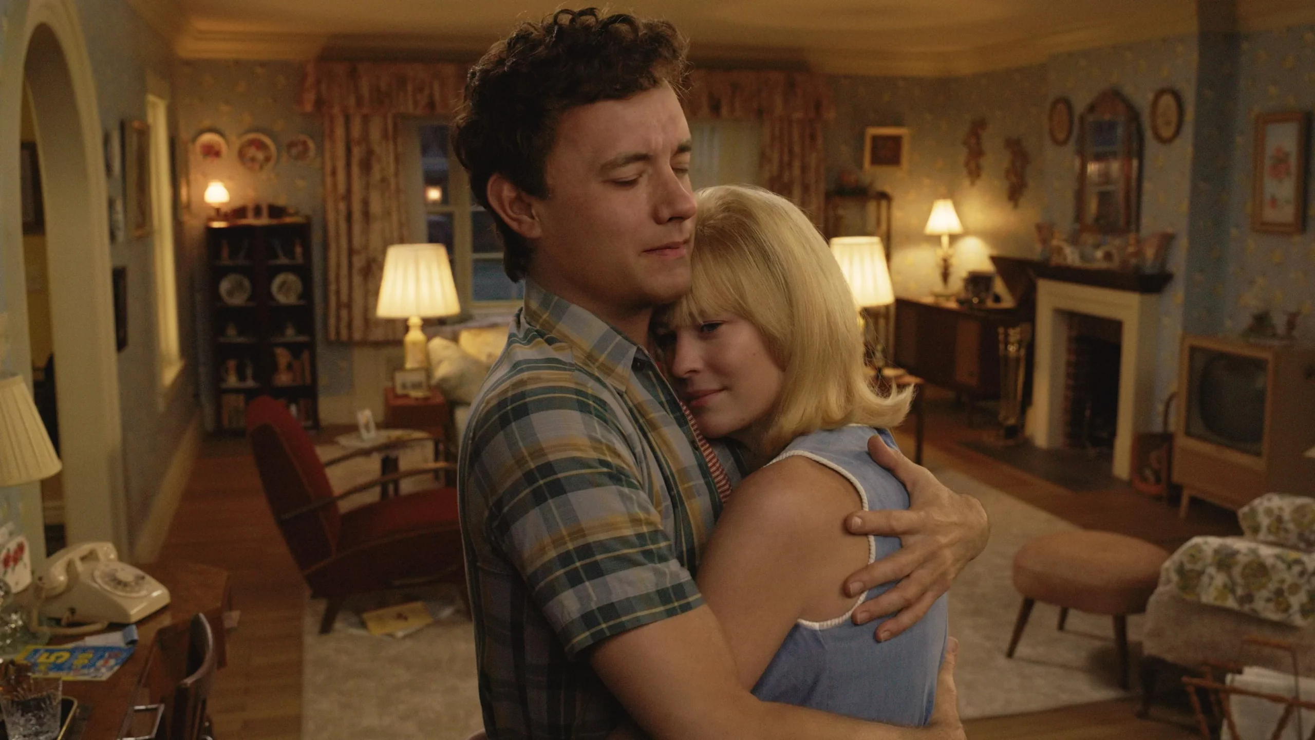 Tom Hanks and Robin Wright embrace in a hug.