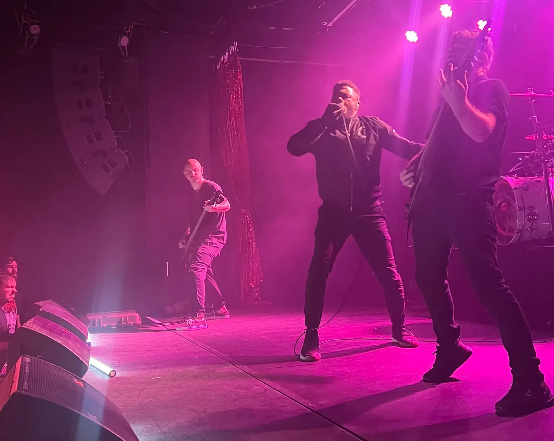 Oceano performs under pink lighting at Metro Music Hall.