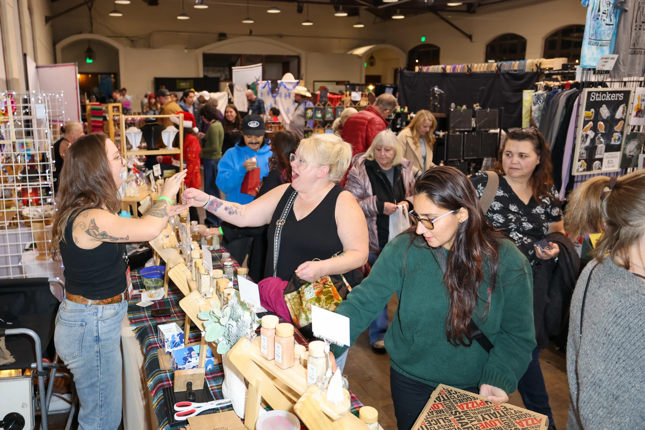 Holiday Market is packed with eager shoppers. Photo: John Barkiple.