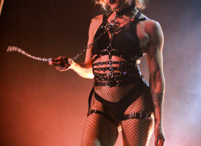 Taking a moment of pause, Michelle looks directly at the audience.