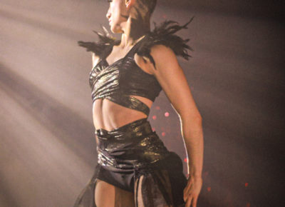 Jax Creative strikes a power pose.