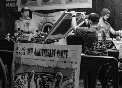 Ritual Print Co. making custom SLUG shirts at the party.