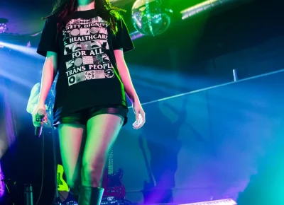 Lauren Mayberry looks down at the crowd of adoring fans. Photo: Derek Brad.