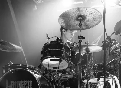 Lauren Mayberry's backing band uplifts her electric performance. Photo: Derek Brad.