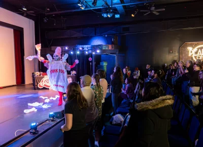 TomBoy gives a showstopping performance in a plastic bag dress. Photo: Derek Brad