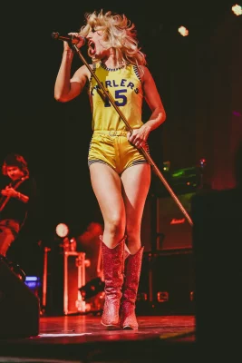 Lead singer Amy Taylor screams into the mic during the band's opening song "Control."