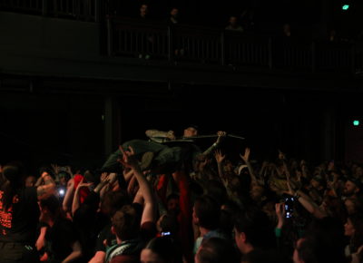 Laurie Vincent of SOFT PLAY crowd surfs at The Depot, with a sold out crowd. Photo: Logan Sorenson.