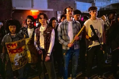 A group of punks with makeshift weapons getting ready to fight.