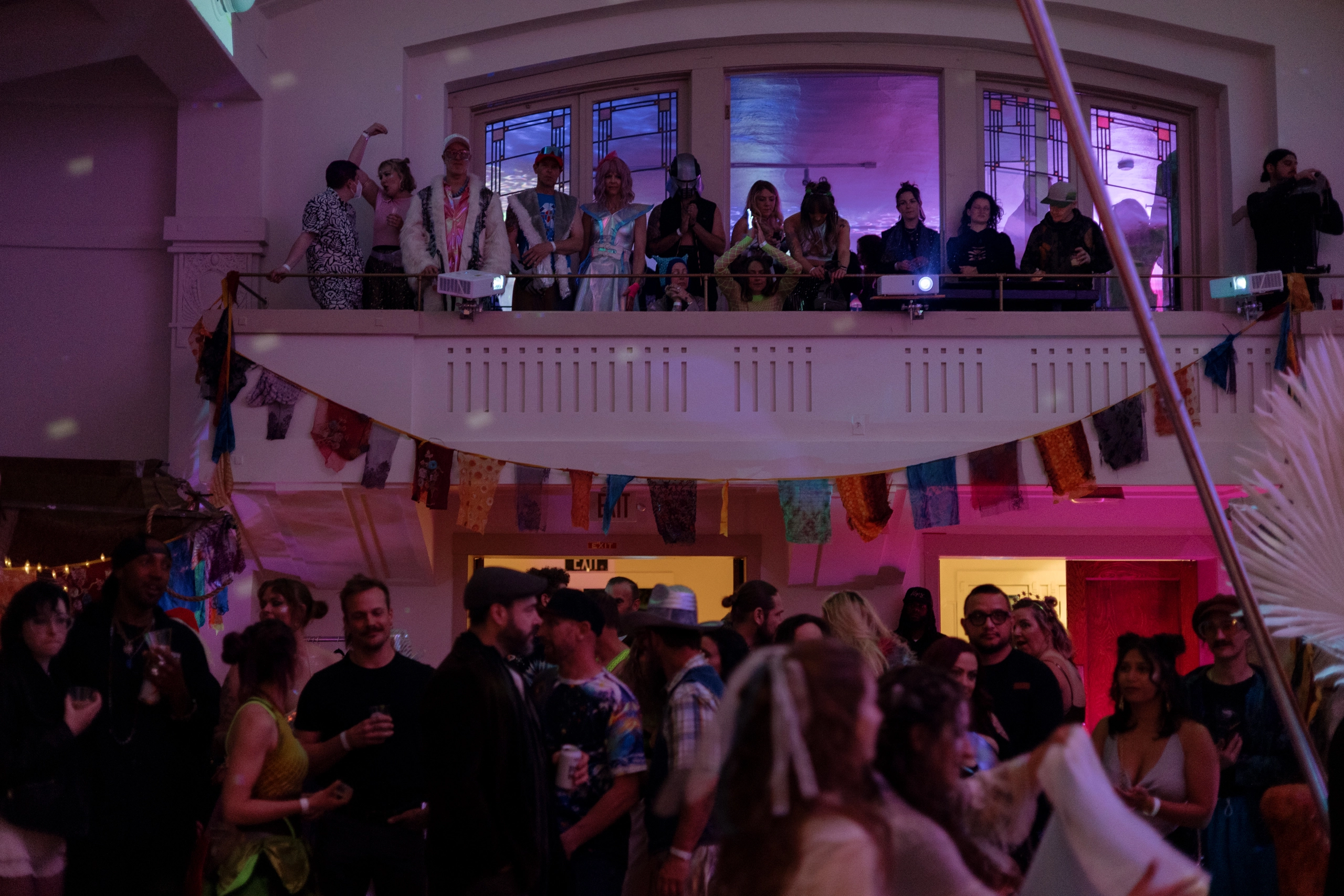 Cabaret-goers pack into a ballroom.