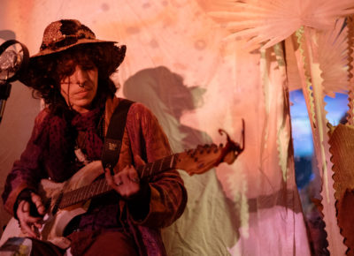 Downstairs at the cabaret various music artists take turns on an open mic. Photo: Emily Sorensen.