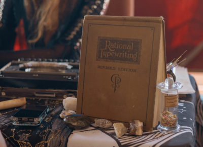 Rebekah Shea Parke listens to a customer while manning the Poets for Hire booth. Photo: Emily Sorensen.