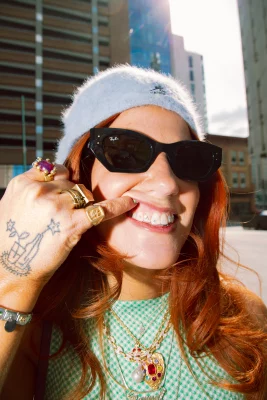 Hanna Tatro showing off her bejeweled teeth