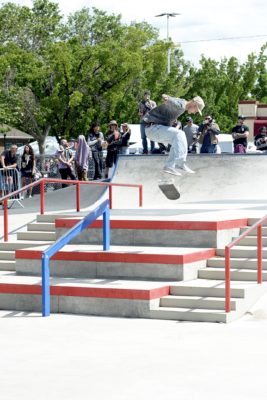 Shylio Sweat (@shyliosweat) does a heelflip over the three block.