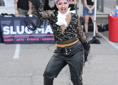 A drag queen strikes a pose.