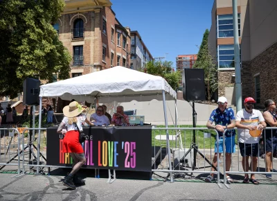 Can't leave the announcers without a copy of SLUG. Photo: TaCara DeTevis.