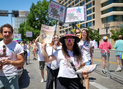 Tiana Young showing off the June's issue cover. Photo: TaCara DeTevis.